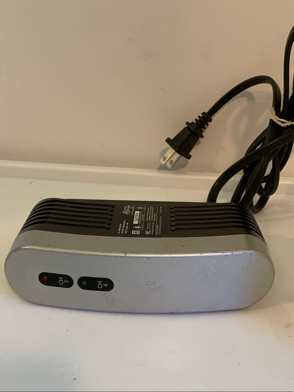 Silver and Black External Laptop Power Adapter with Indicator LEDs